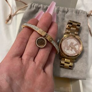 Woman’s Michael Kors watch with matching bracelet